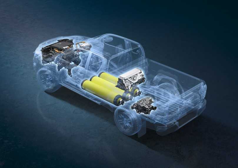 Insgesamt drei Wasserstofftanks sitzen bei dem Hilux-Prototyp zwischen den Achsen. | Foto: Toyota Insgesamt drei Wasserstofftanks sitzen bei dem Hilux-Prototyp zwischen den Achsen. | Foto: Toyota