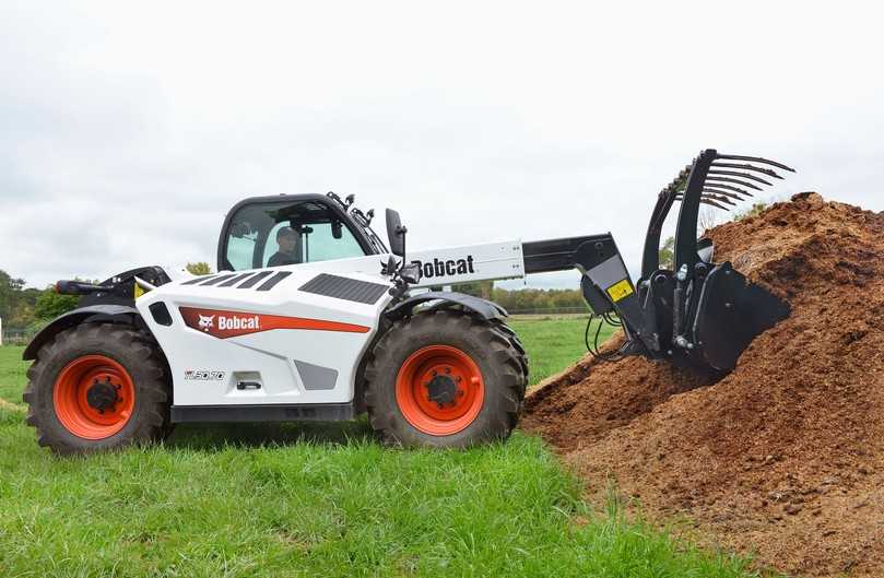 Die Bobcat-Greiferschaufel beseitig mühelos Schrott, Abfälle, Schnittgut und andere Materialien. | Foto: Bobcat Die Bobcat-Greiferschaufel beseitig mühelos Schrott, Abfälle, Schnittgut und andere Materialien. | Foto: Bobcat